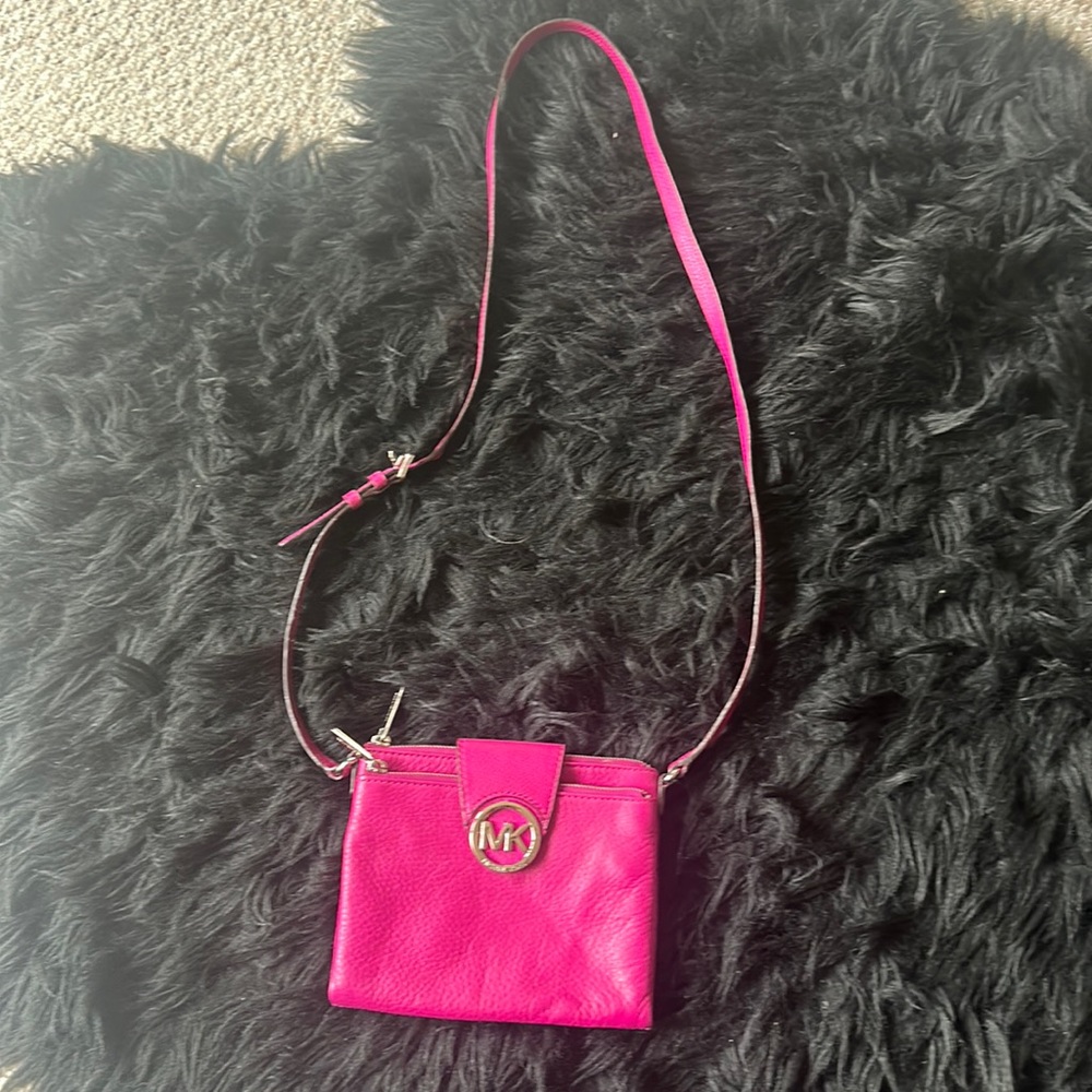 Michael Kors hot pink leather crossbody.
